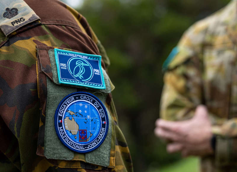 Major Eddie Jarope of the Papua New Guinea Defence Force in conversation with Lieutenant Colonel Scott Hill of the Australian Defence Force during Exercise Croix du Sud 2025.