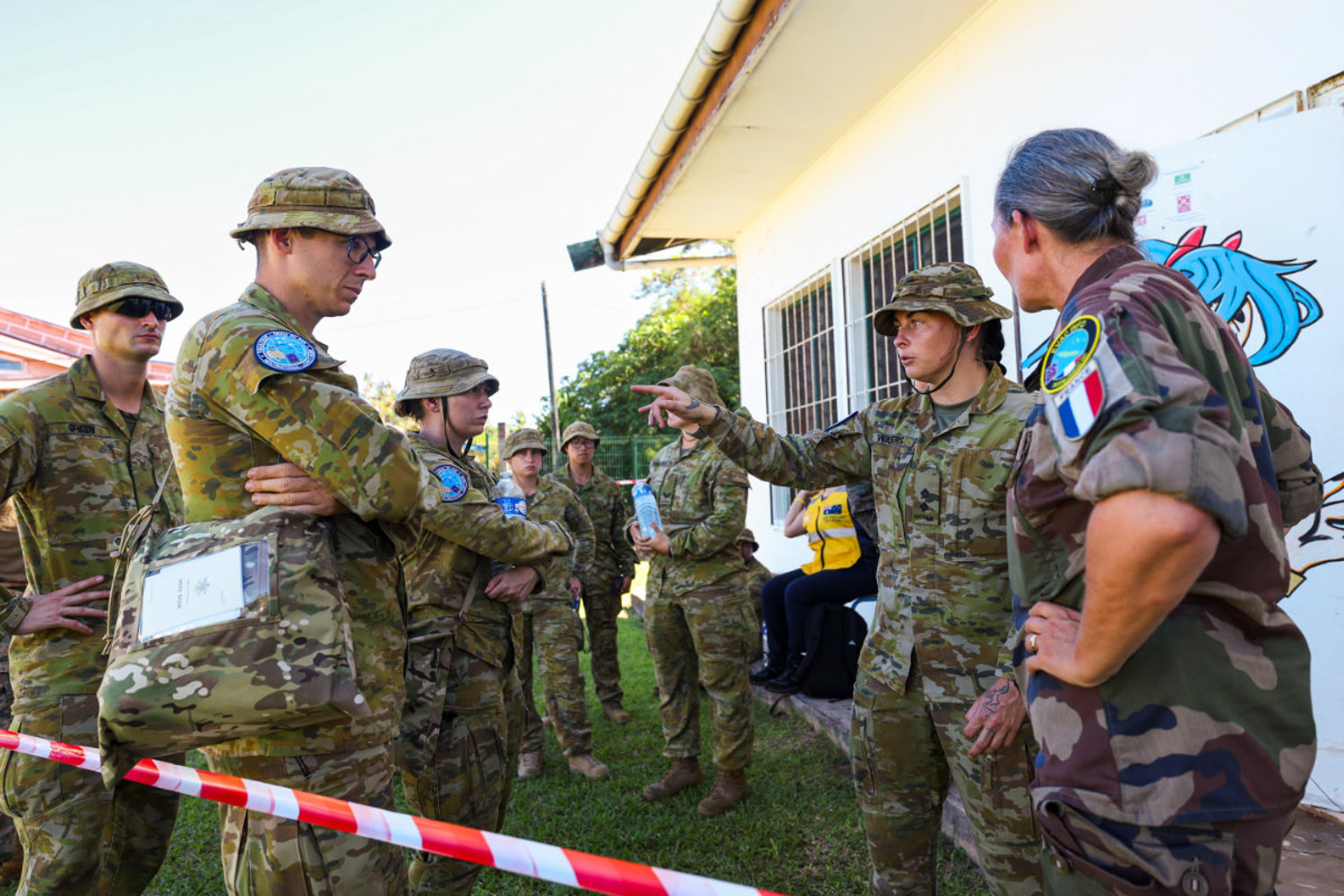 Members of the Australian Defence Force and French Armed Forces in New Caledonia participate in a Non Combatant Evacuation Operation (NEO) rehearsal during Exercise Croix du Sud 2025 in Wallis and Futuna.