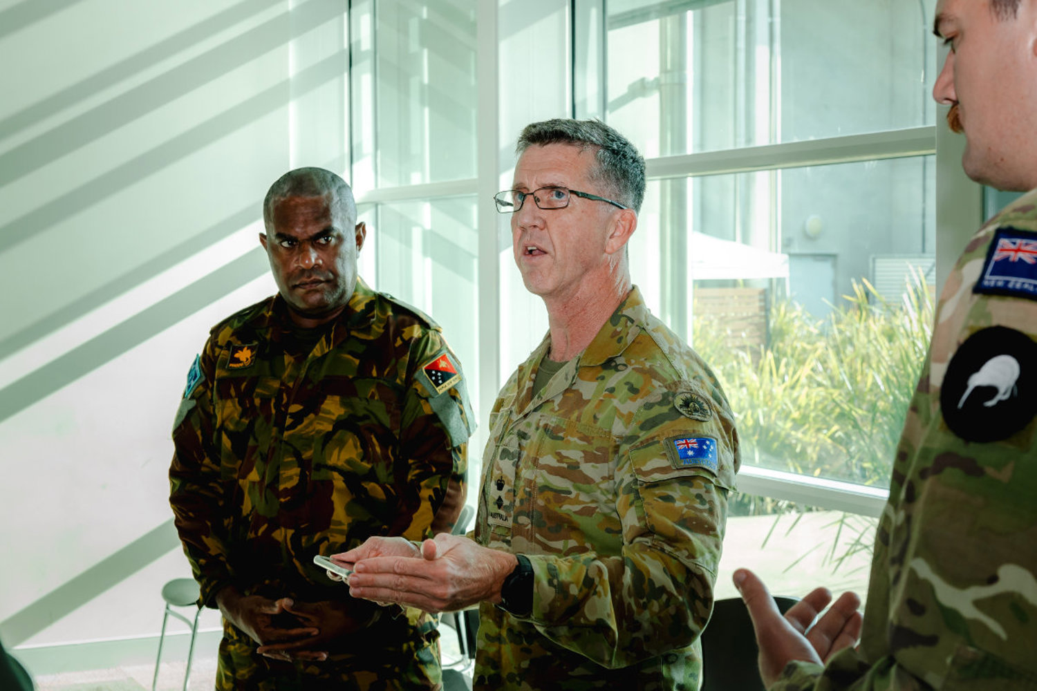 Commander of the Pacific Response Group, Lieutenant Colonel Scott Hill, briefs the six Pacific Response Group deployed personnel to provide specialist planning support for Vanuatu following the earthquake on 17 December 2024.
