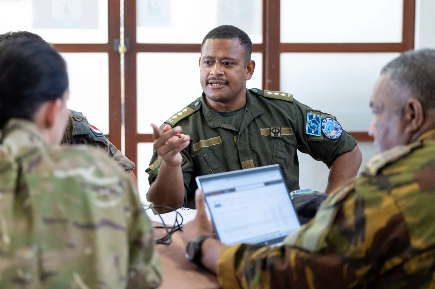 Captain Savenaca Degei of the Republic of Fiji Military Forces conducting planning with the Pacific Response Group during Exercise Croix du Sud 2025.